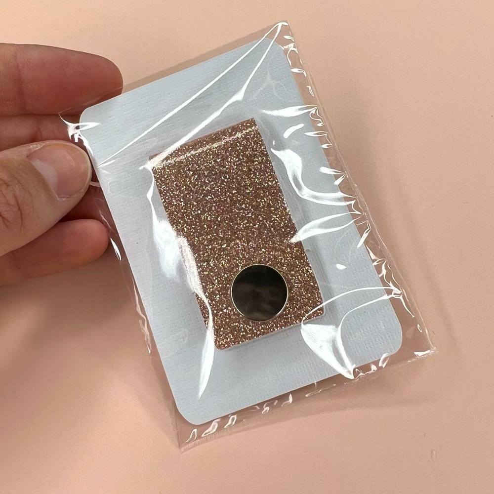 Handmade cord keeper shiny sparkly rose gold